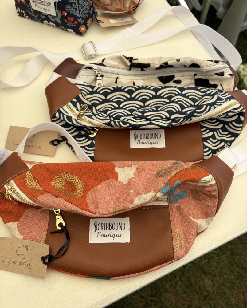 Handmade fanny packs at Northbound Boutique's vendor table